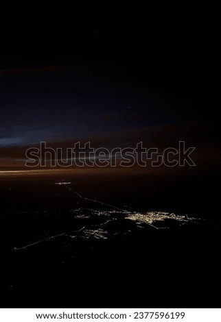 A night picture flying over a city