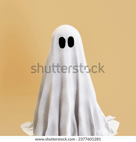White halloween ghost with black eyes, spooky face, scary concept