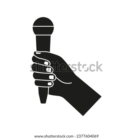 Hand holding a microphone icon. Vector. Flat design.