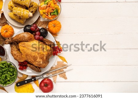 Festive dishes for Thanksgiving Day on white wooden background