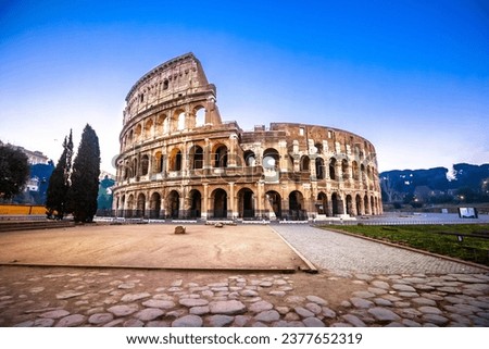 Rome. Empty Colosseum square in Rome dawn view, the most famous landmark of eternal city, capital of Italy Royalty-Free Stock Photo #2377652319