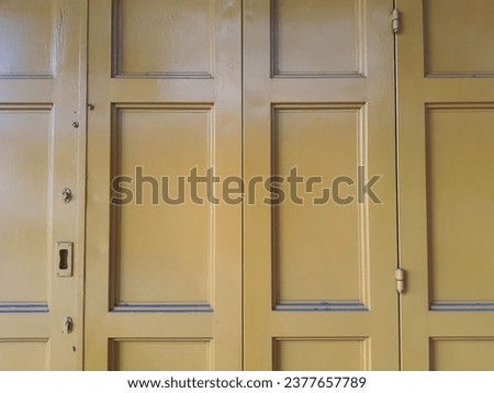 photo of yellow squared door