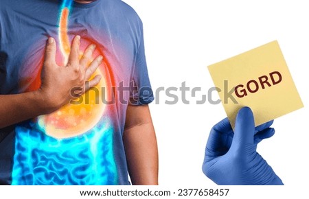 Gastro-oesophageal Reflux Disease (GORD). Symptoms of Gastro-oesophageal Reflux Disease. Illustration of normal internal organ and stomach with Acid reflux.  Royalty-Free Stock Photo #2377658457