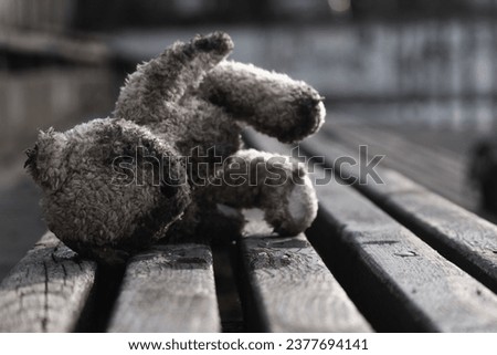 Conceptual image: Russia's war against Ukraine, ruined children's lives as a result of Russian aggression, loss childhood and future. Broken toys, broken life Royalty-Free Stock Photo #2377694141