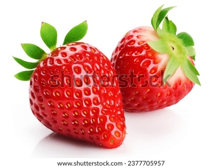 Two whole strawberries isolated on white background. Royalty-Free Stock Photo #2377705957