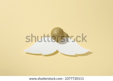 White paper mustache on a light background