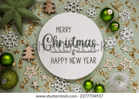 Text Merry Christmas And Happy New Year, With Green Christmas Decoration, Winter Decor, Festive Background Flatlay