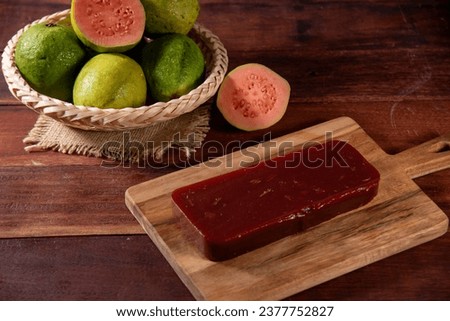guava sweet with Minas cheese on rustic wooden background.