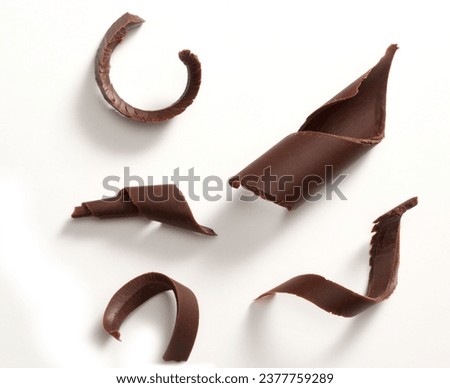 Chocolate Curls isolated on a white background Royalty-Free Stock Photo #2377759289