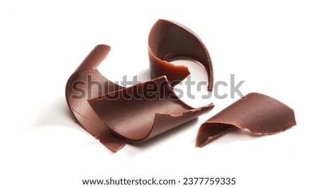 Chocolate Curls isolated on a white background Royalty-Free Stock Photo #2377759335