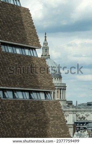 Tate modern blocks view of St Pauls cathedral in London on summers day