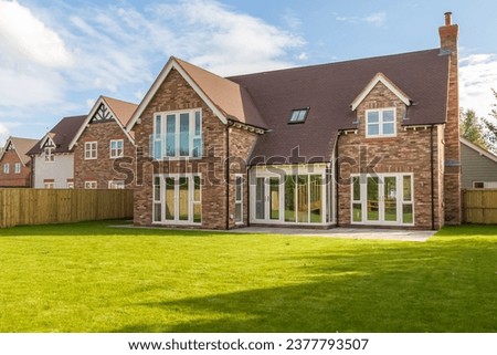 Large executive new build house on an exclusive development in the English countryside Royalty-Free Stock Photo #2377793507