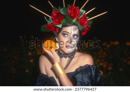 Day of the dead: Enchanting Mexican Catrina Holding a cempasuchil Flower in Dreamy Portrait