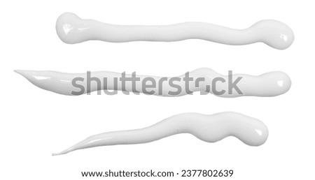 Sun lotion spilled, tanning cream puddle, white skincare product isolated on white, top view, clipping path Royalty-Free Stock Photo #2377802639
