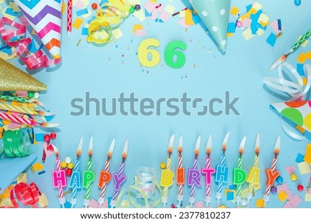 Top view card happy birthday with number  66. Copy space. Postcard holiday anniversary. Happy birthday multicolored background for mensto text, with a numeral with pretty decorations in pastel colors. Royalty-Free Stock Photo #2377810237