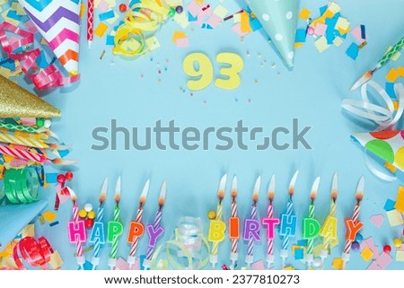 Top view card happy birthday with number  93. Copy space. Postcard holiday anniversary. Happy birthday multicolored background for mensto text, with a numeral with pretty decorations in pastel colors. Royalty-Free Stock Photo #2377810273