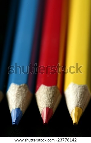 Colorful set three pen in vibrant colors over black background