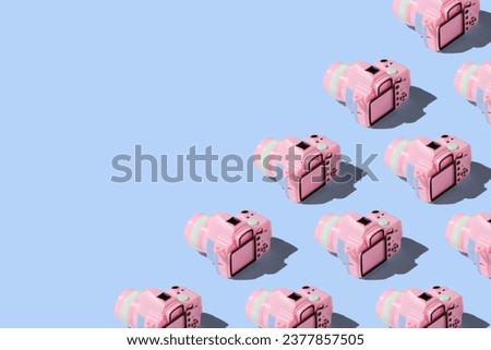 Pattern with camera on pastel color background