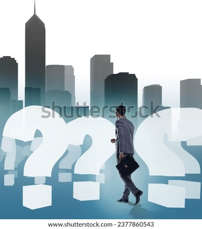 Businessman in uncertainty concept with question marks Royalty-Free Stock Photo #2377860543