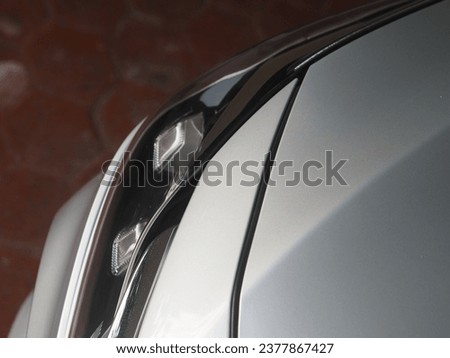 A closeup view of a car. 