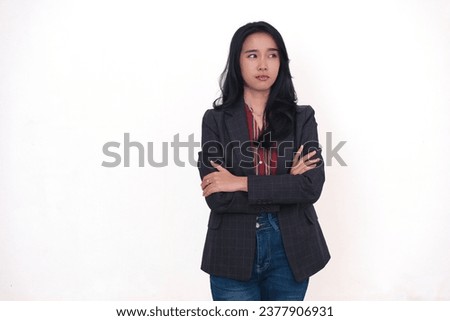 A miserable facial expression of an office employee working under a lot of stress Royalty-Free Stock Photo #2377906931