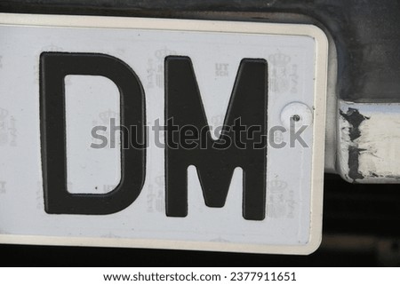 a Spanish number plate on a Spanish car with the letters 'DM', Alicante Province, Costa Blanca, Spain Royalty-Free Stock Photo #2377911651