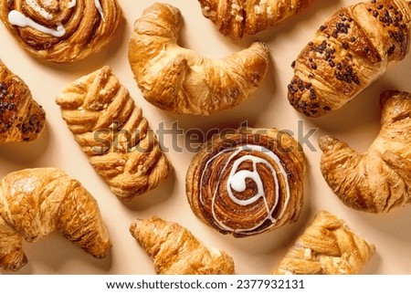 assorted freshly baked pastries, top view Royalty-Free Stock Photo #2377932131