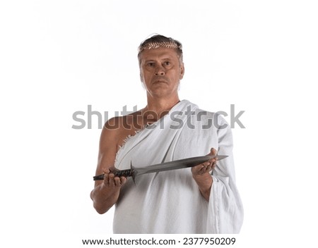 portrait of an ancient Roman Emperor in a white tunic Royalty-Free Stock Photo #2377950209