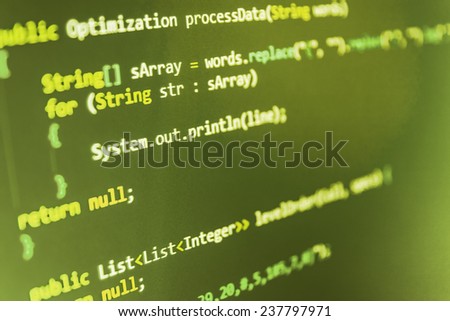 Programming code abstract screen of software developer. Computer script. Green, yellow color.