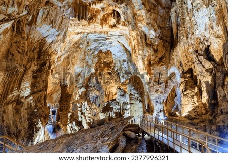 Beautiful view of stalactites and stalagmites inside Tien Son Cave at Phong Nha-Ke Bang National Park in Vietnam. Tien Son Cave is a popular tourist attraction of Asia. Royalty-Free Stock Photo #2377996321
