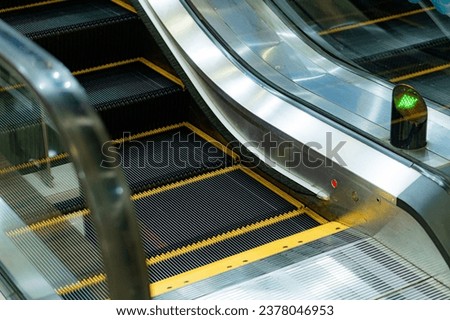 Station escalators. Comfort and safety of movement of passengers. Royalty-Free Stock Photo #2378046953