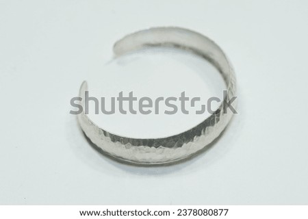 Handmade silver bangle, Silver jewelry on white background Royalty-Free Stock Photo #2378080877
