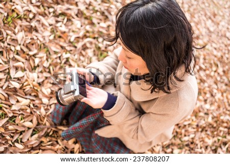 Young lady takes a picture