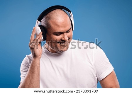 man with headphones listening to music