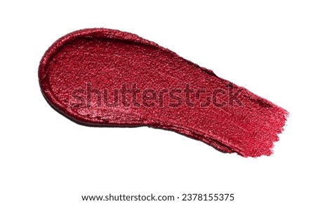 Red shimmering lipstick texture in heart shape, texture stroke isolated on white background. Cosmetic product smear smudge swatch Royalty-Free Stock Photo #2378155375