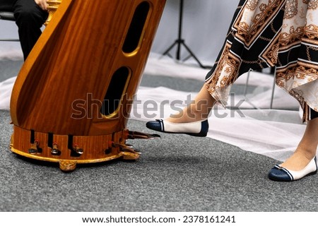 harp, a classical instrument, close-up of the foot and pedal Royalty-Free Stock Photo #2378161241