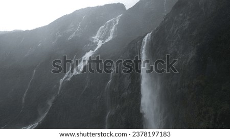 Waterfalls and Serenity in Milford Sound, Piopiotahi Scenic Landscape with Misty Mountains, Fiordland, Road Trip in New Zealand