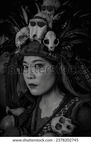 Black and white photo of traditional Indonesian Minahasa costume