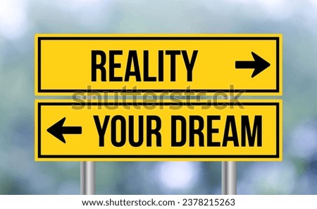 Reality or your dream road sign on blur background