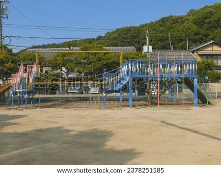 Playground equipment on the park in the village.
This type of scenes are commonly seen in Japanese towns.
The scene of a rural Japan.