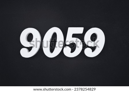 Black for the background. The number 9059 is made of white painted wood.