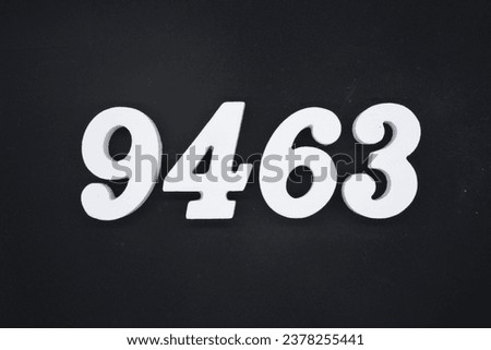 Black for the background. The number 9463 is made of white painted wood.