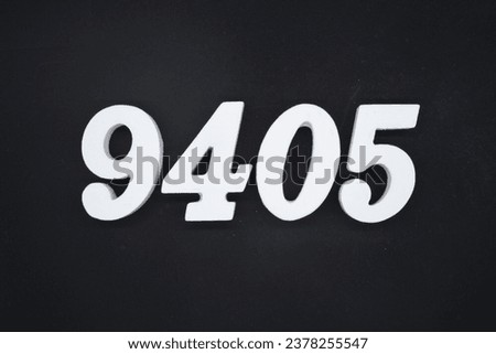 Black for the background. The number 9405 is made of white painted wood.