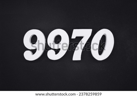 Black for the background. The number 9970 is made of white painted wood.
