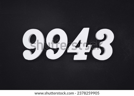 Black for the background. The number 9943 is made of white painted wood.