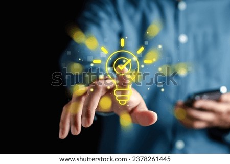 Quick tips for smart creative. light bulb and idea checking concept. Royalty-Free Stock Photo #2378261445