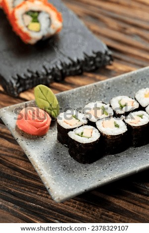 One Bite Size Mini Maki Sushi with Crab Stick on Stone Plate 
