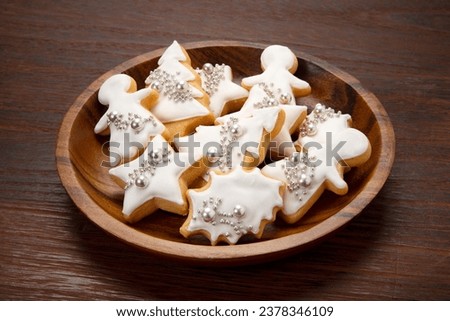 Icing cookies on a small plate