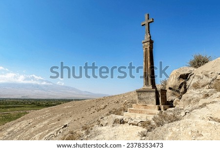 Old cross on the hill near Khor Virap monastery in Armenia