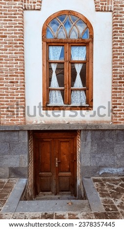 old wooden door and window- Ardabil, Iran Royalty-Free Stock Photo #2378357445